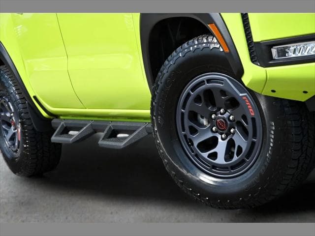 2026 Nissan Frontier Truck in Tactical Green Metallic thumbnail 11