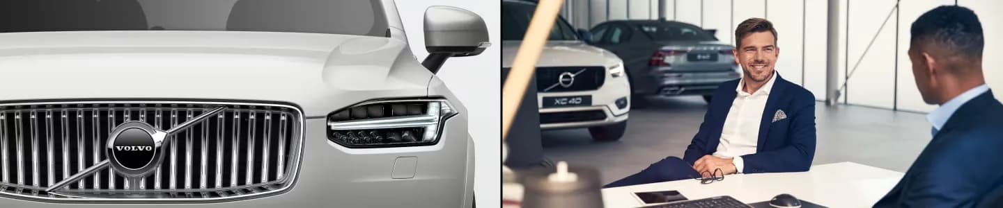Volvo grille with a salesperson in the showroom